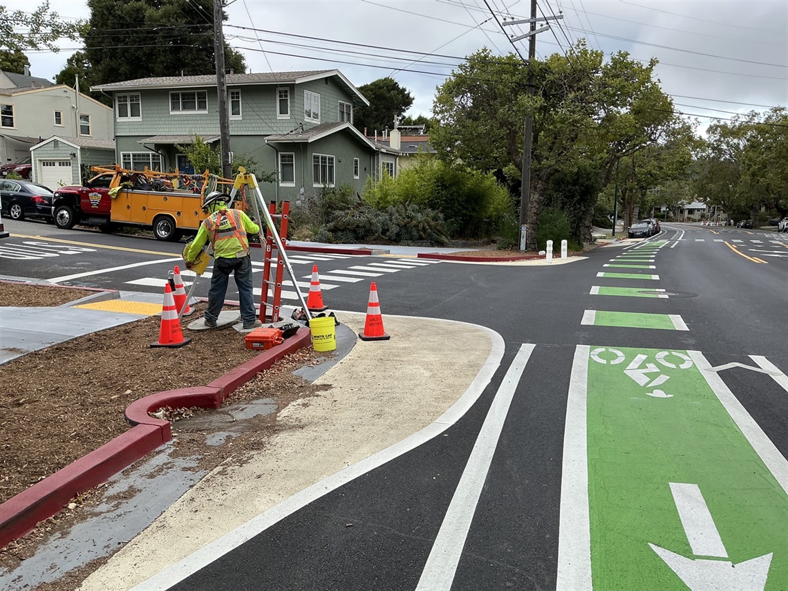 Construction Worker on Marin Ave next to newly painted bike lane