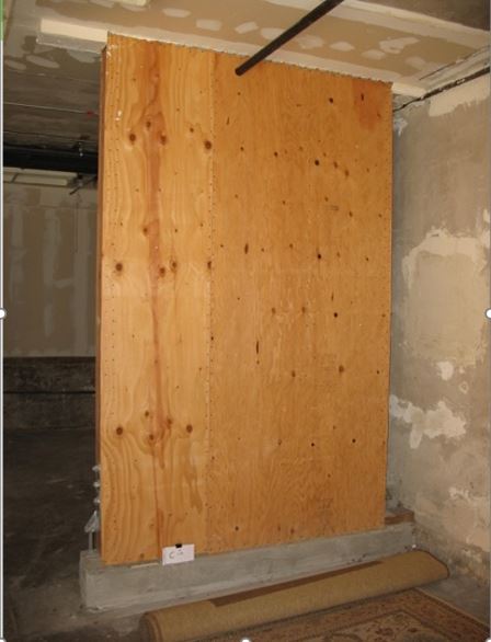 Wood sheathing added to existing walls