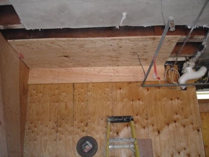 Wood sheathing added to existing walls